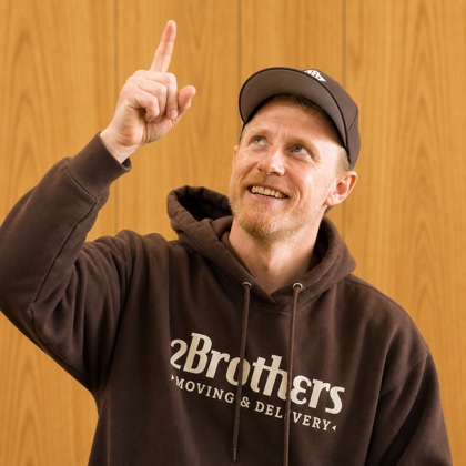 John pointing up