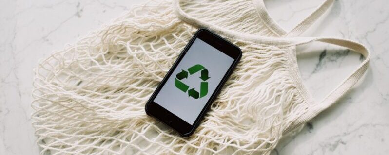 cell phone showing recycle logo