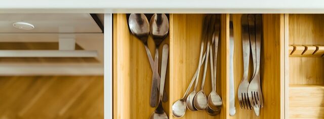 Silverware drawer full of utensils