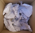 crumpled paper in box
